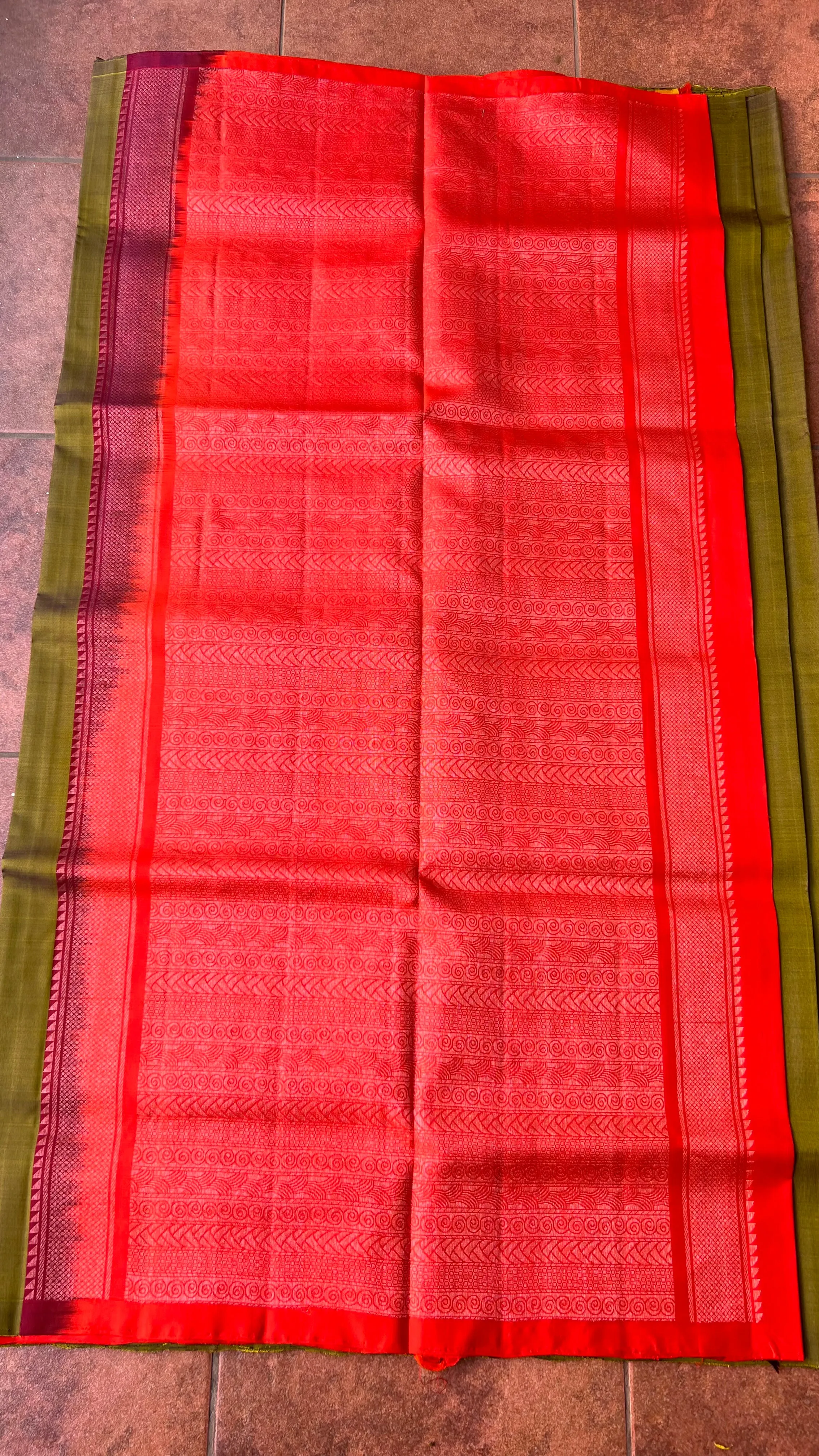 Bottle green and orange kanchipuram silk saree with blouse