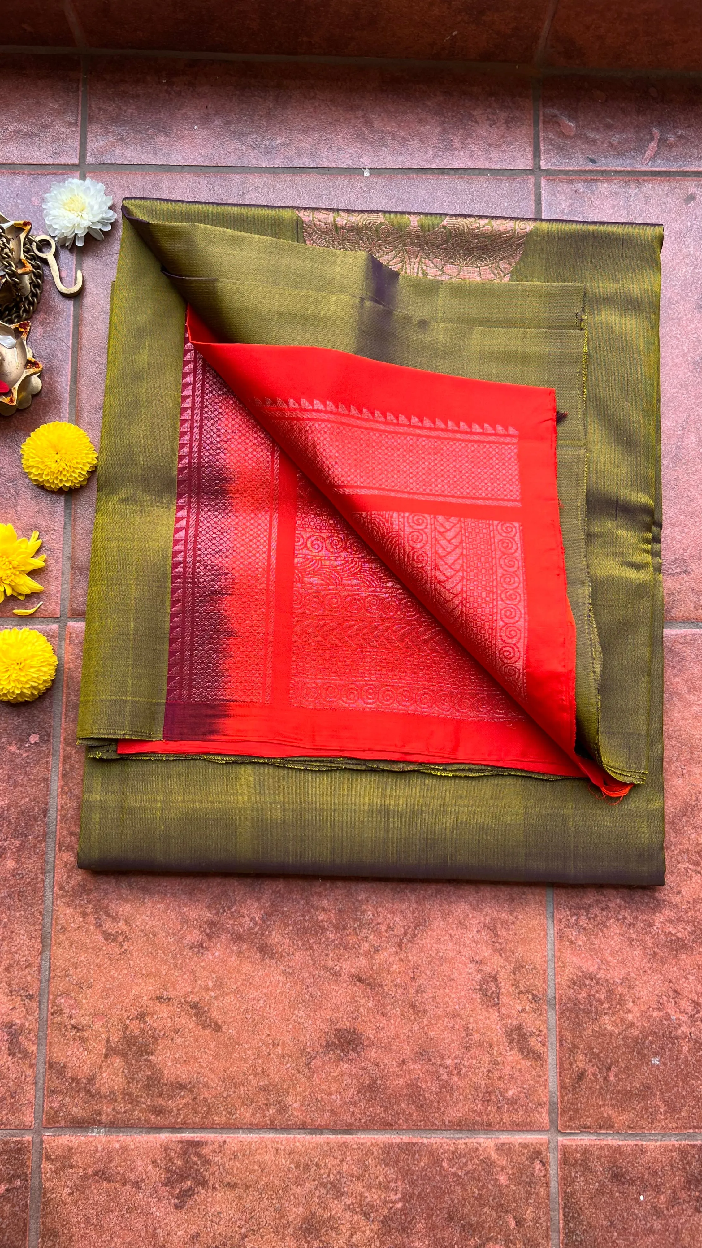 Bottle green and orange kanchipuram silk saree with blouse