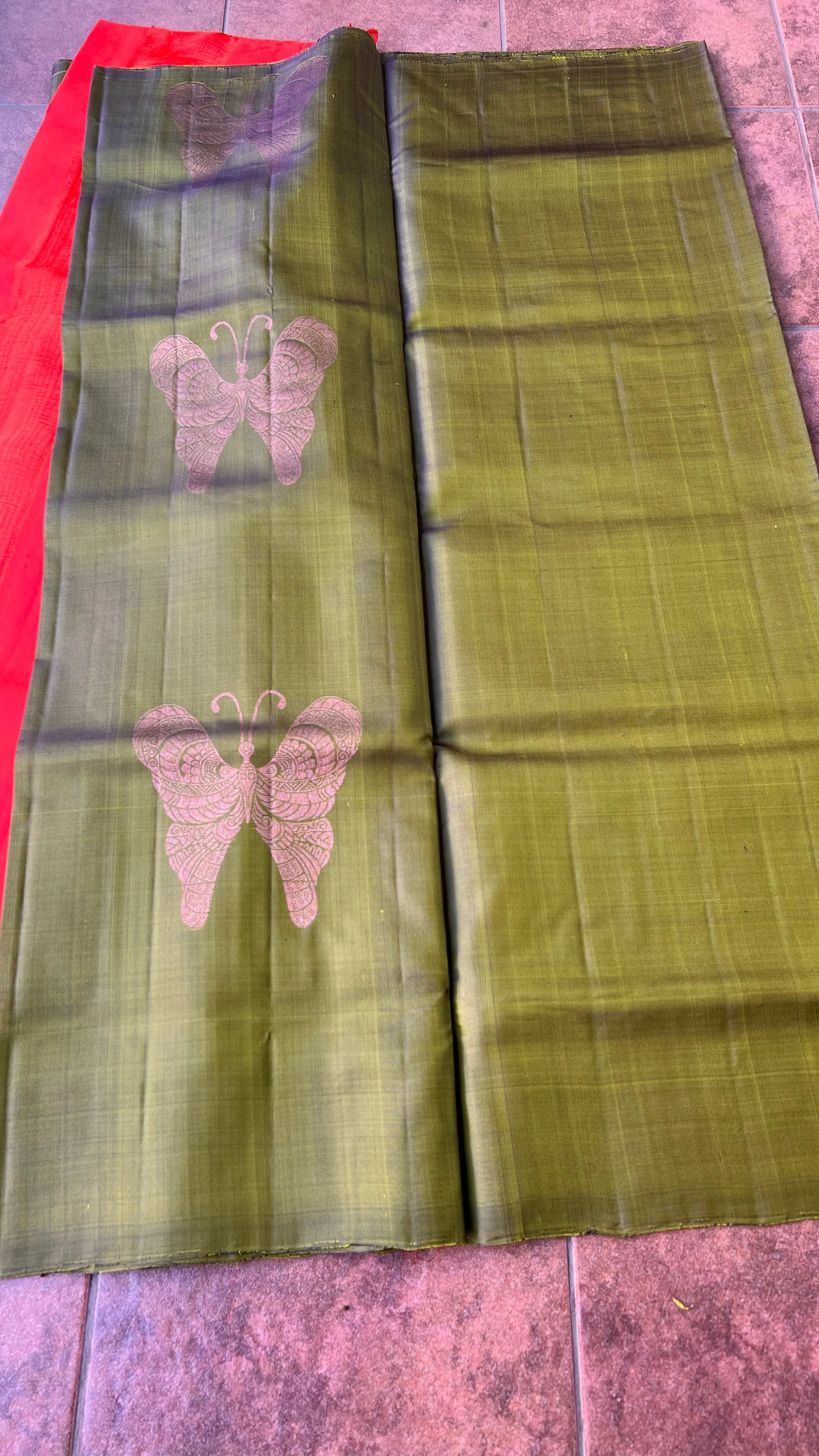 Bottle green and orange kanchipuram silk saree with blouse