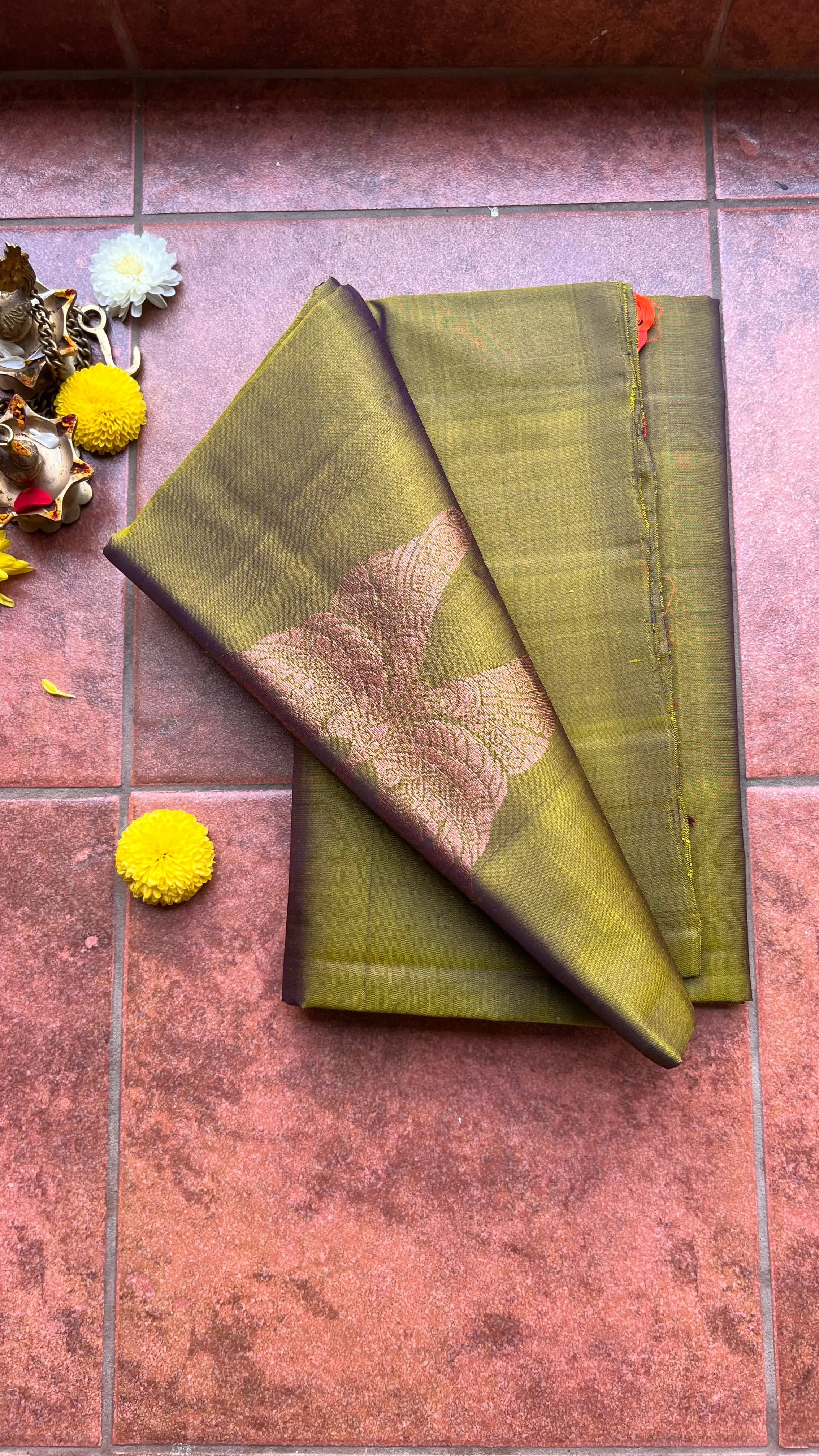 Bottle green and orange kanchipuram silk saree with blouse