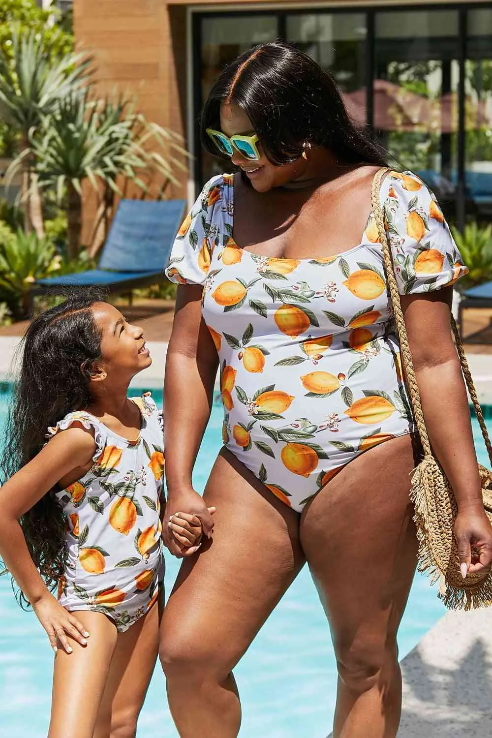 Float On Ruffled Girls One-Piece Swimsuit in Citrus Orange