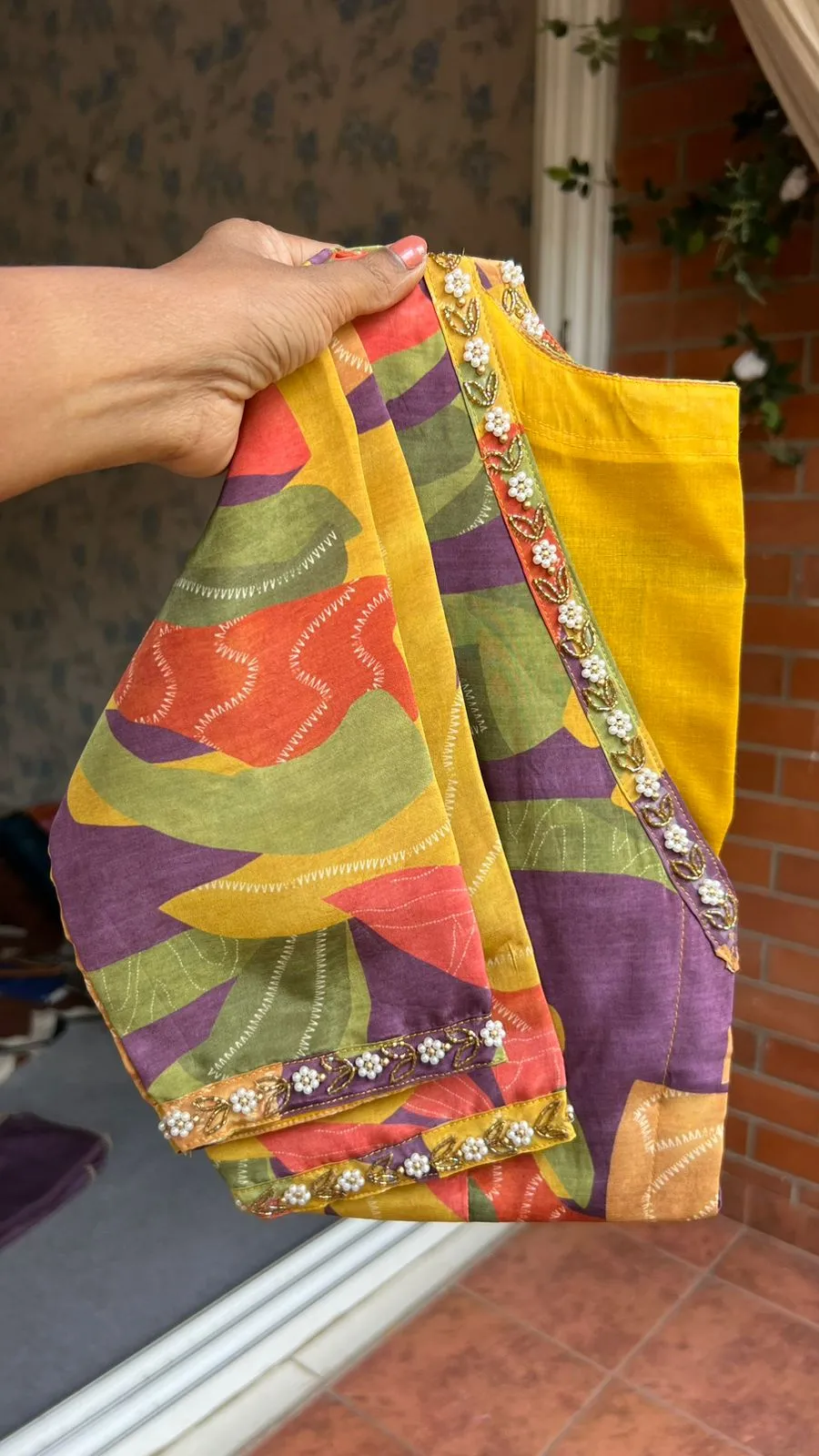 Purple organza saree with silk hand work blouse