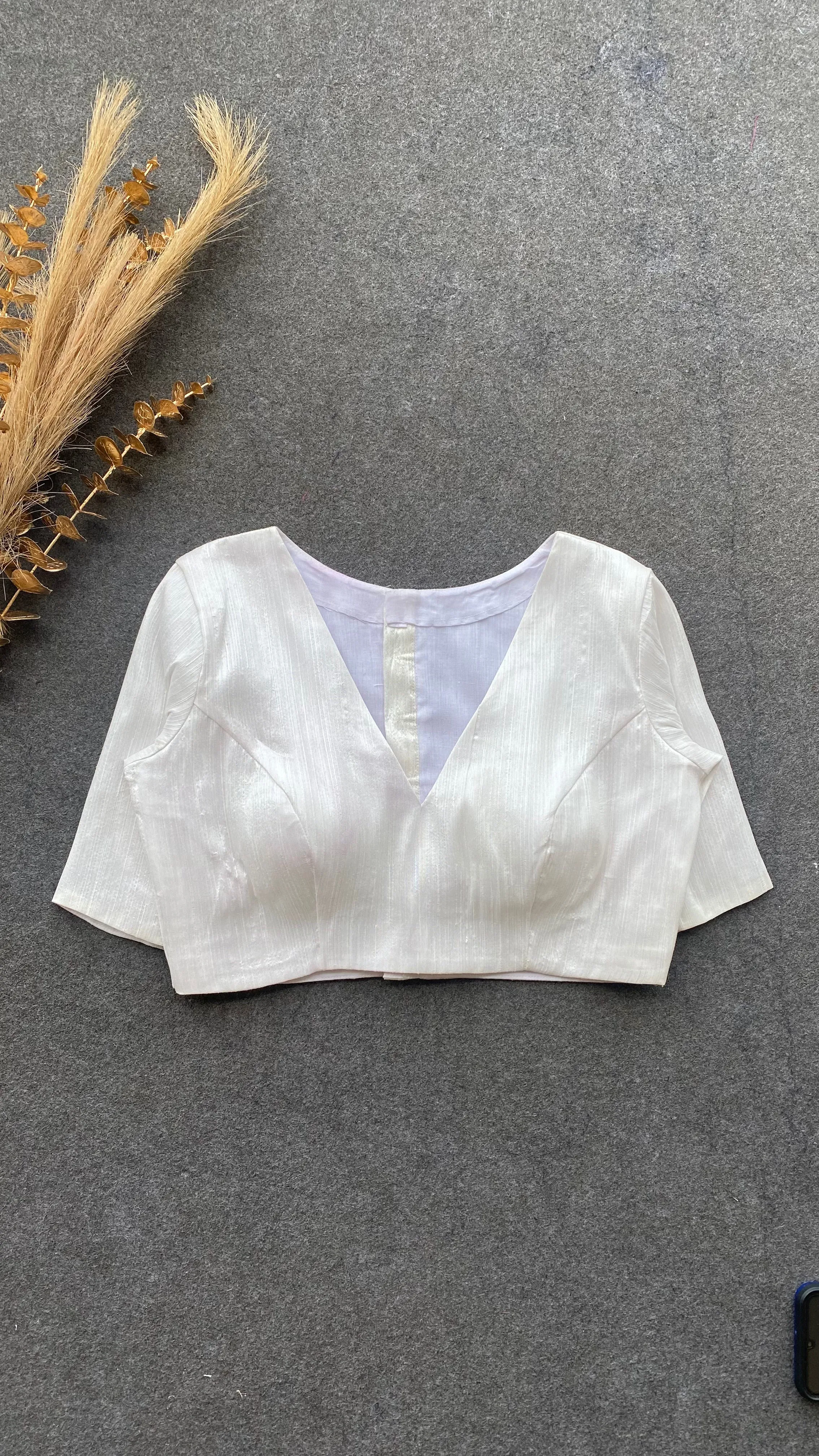 White silk V neck patterned blouse